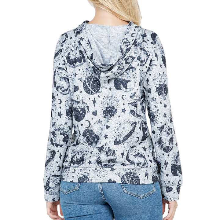 Person wearing a patterned hoodie with a white background