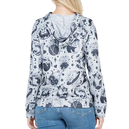 Person wearing a patterned hoodie with a white background