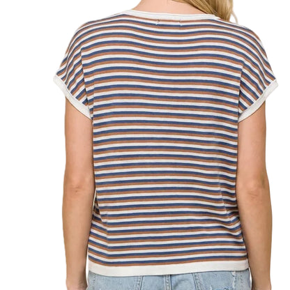 Person wearing a striped shirt and denim shorts on a beige background