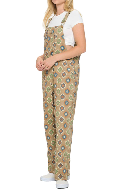 Woman wearing patterned overalls on a white background