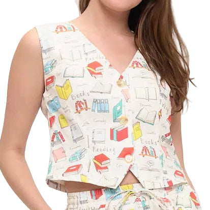 Woman wearing a colorful sleeveless top and skirt set on a white background