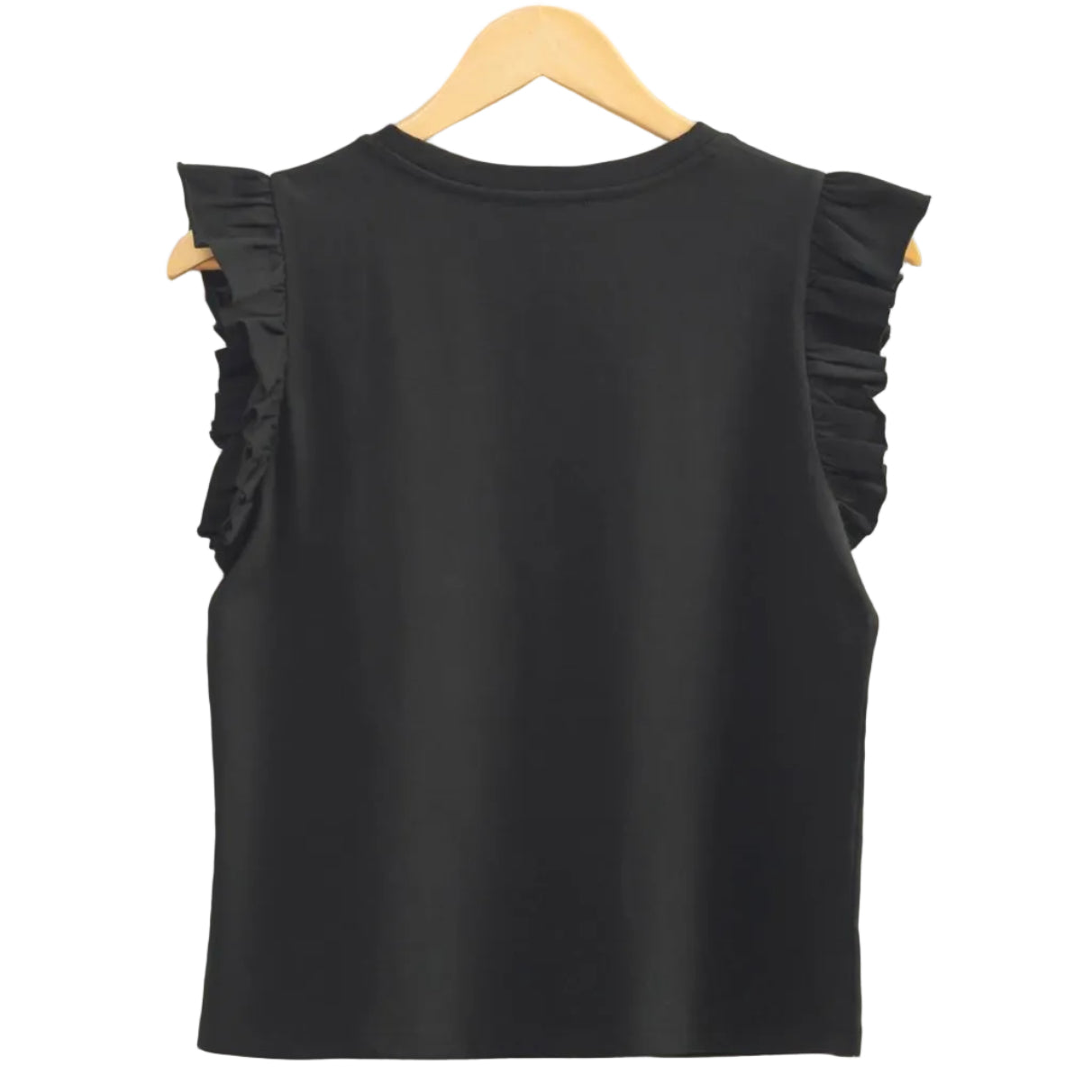 Black sleeveless top with ruffled shoulders on a hanger against a beige wall.
