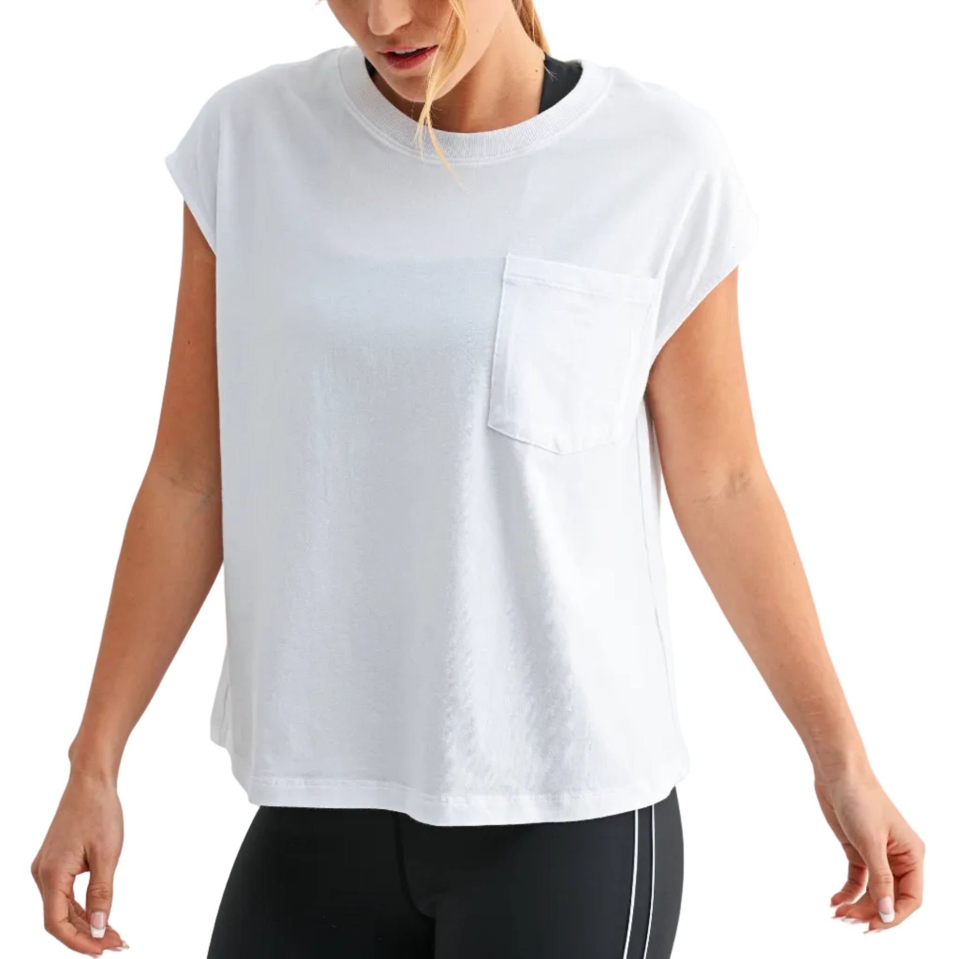 Woman wearing a white t-shirt and black leggings on a light gray background
