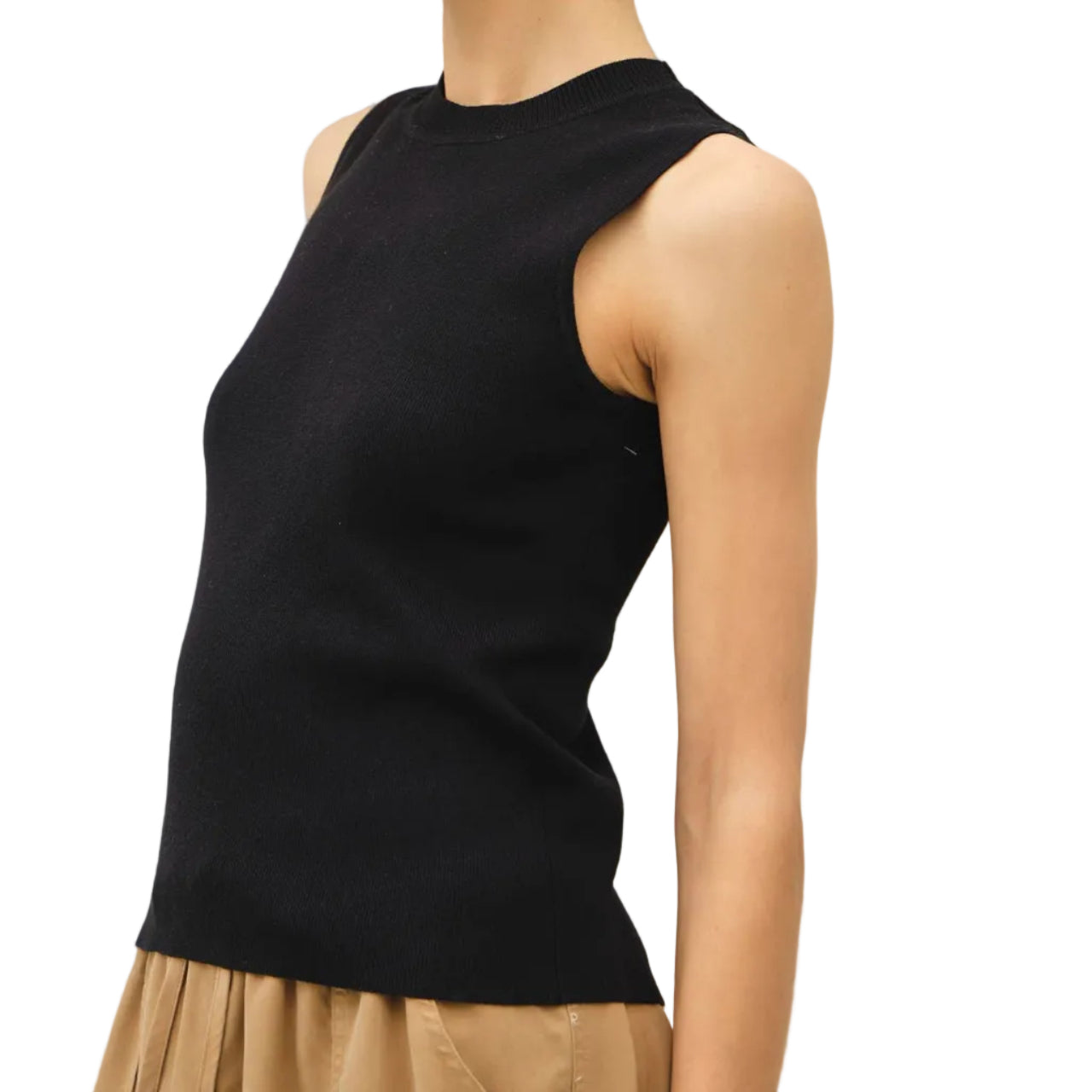 Woman wearing a black sleeveless top against a plain background