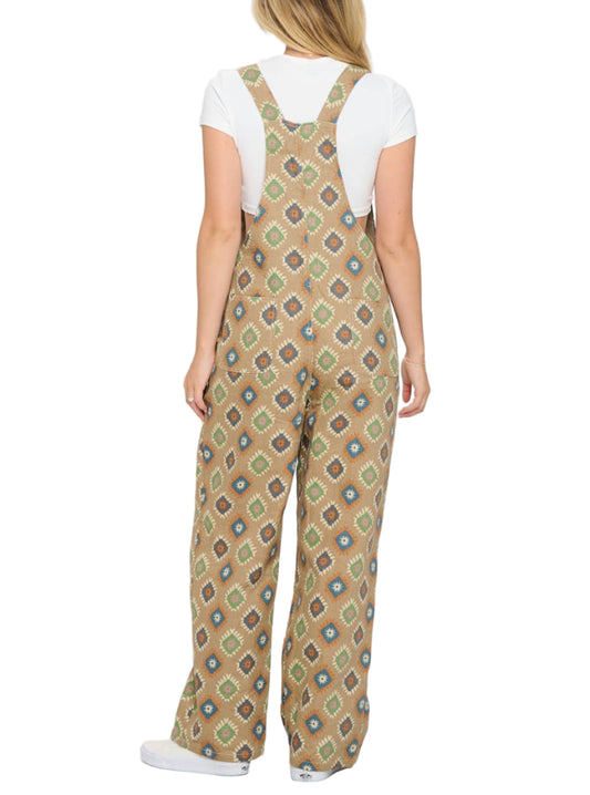 Person wearing a patterned overalls on a white background