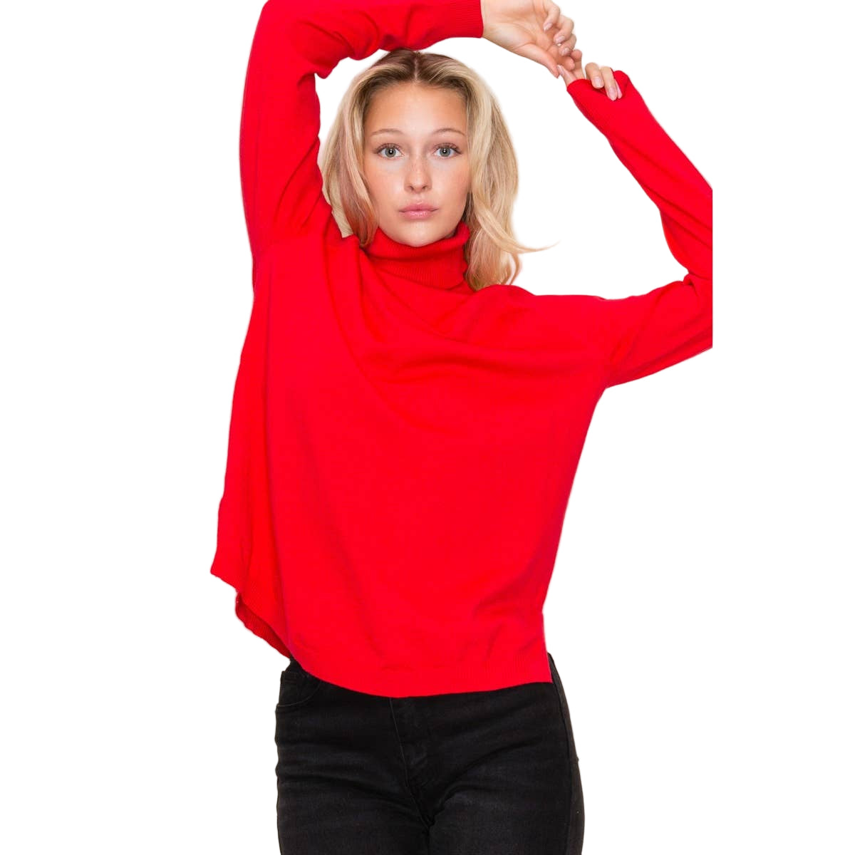 Person wearing a red sweater and black pants against a light background